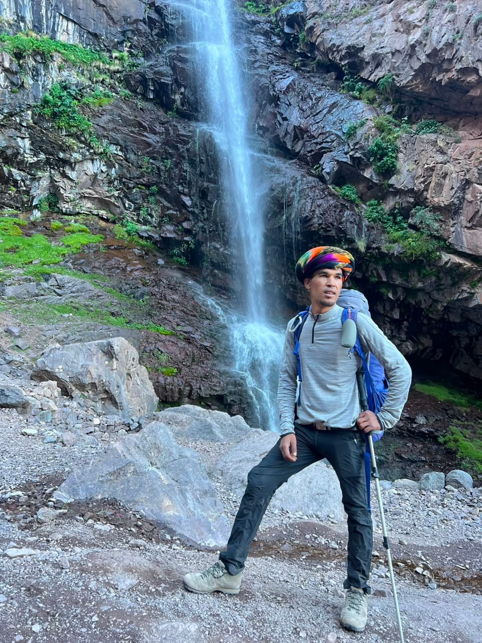 One of our certified Berber mountain guides at a High Atlas waterfall, Morocco
