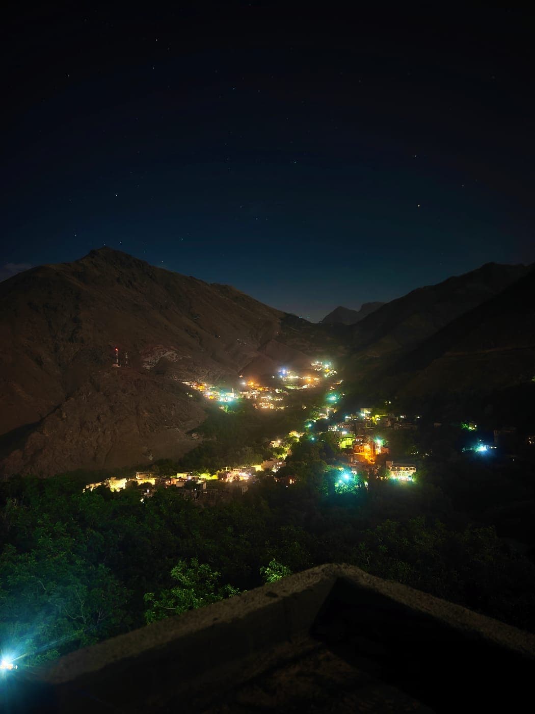 Imlil valley at night — village lights and stars below the High Atlas, Morocco