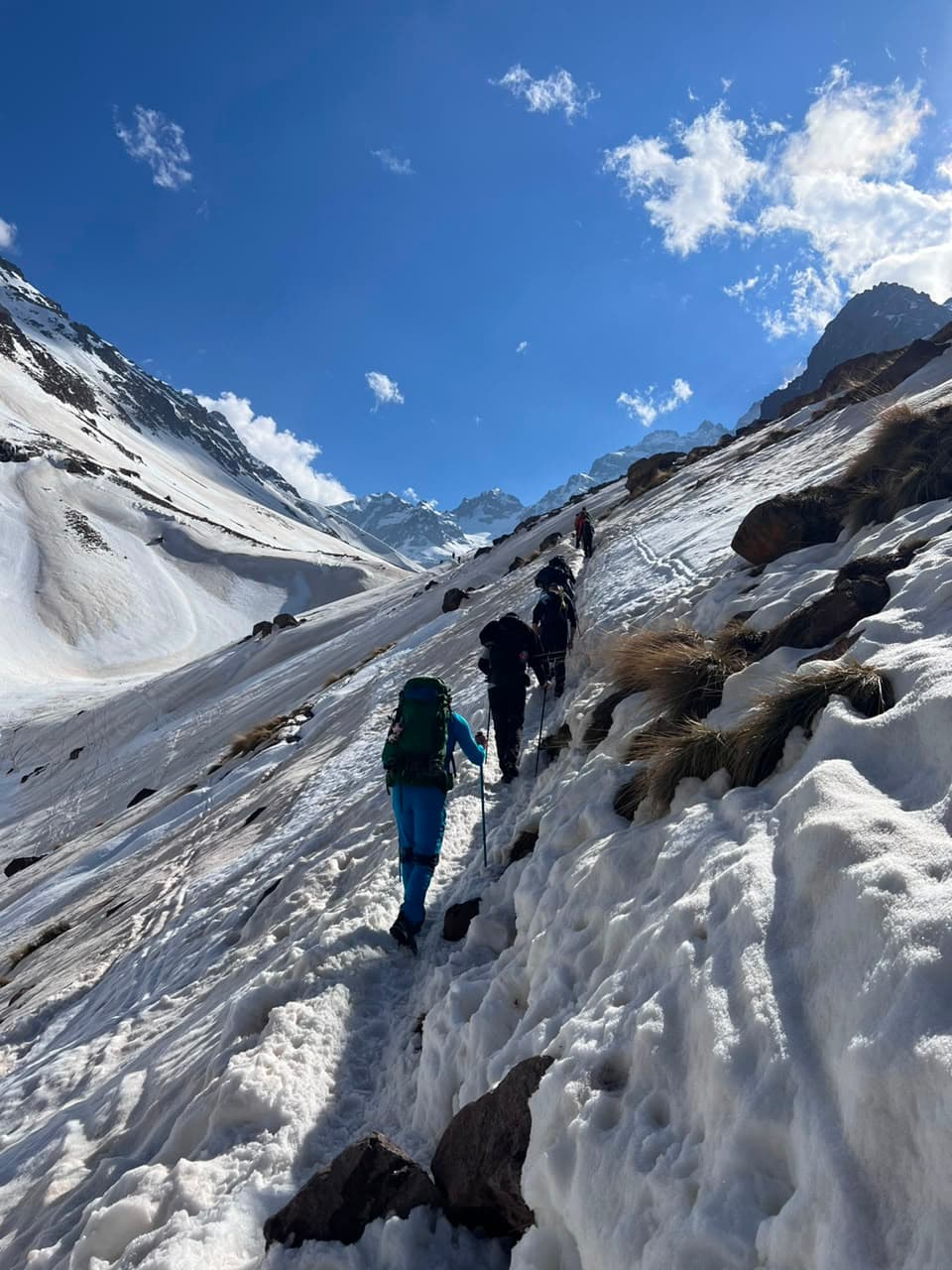Our group traversing a snow slope on a winter ascent in the High Atlas, Morocco